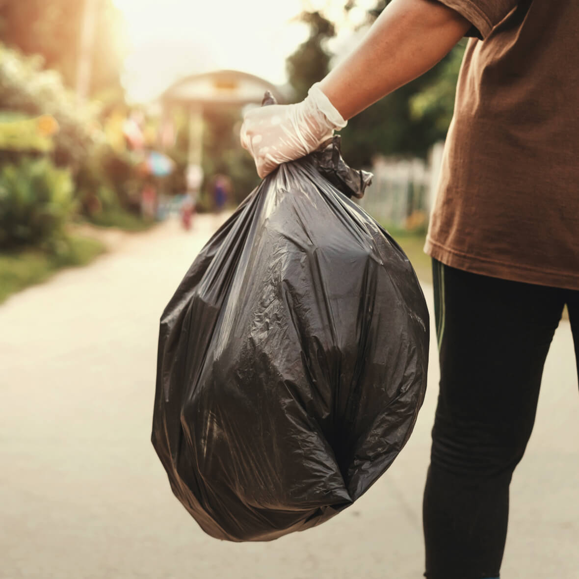 Person putting out rubbish